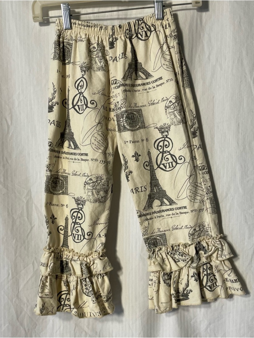 Girls Cream Paris Print Ruffle Hem Pants